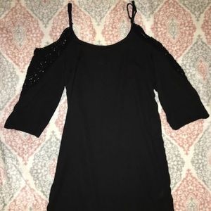 black dress with spaghetti straps and long sleeves